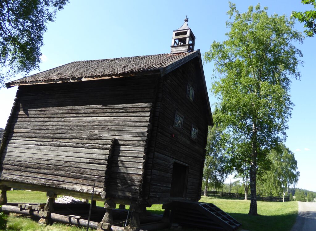 The storehouse with its bell tower at Old Hvam Museum. 